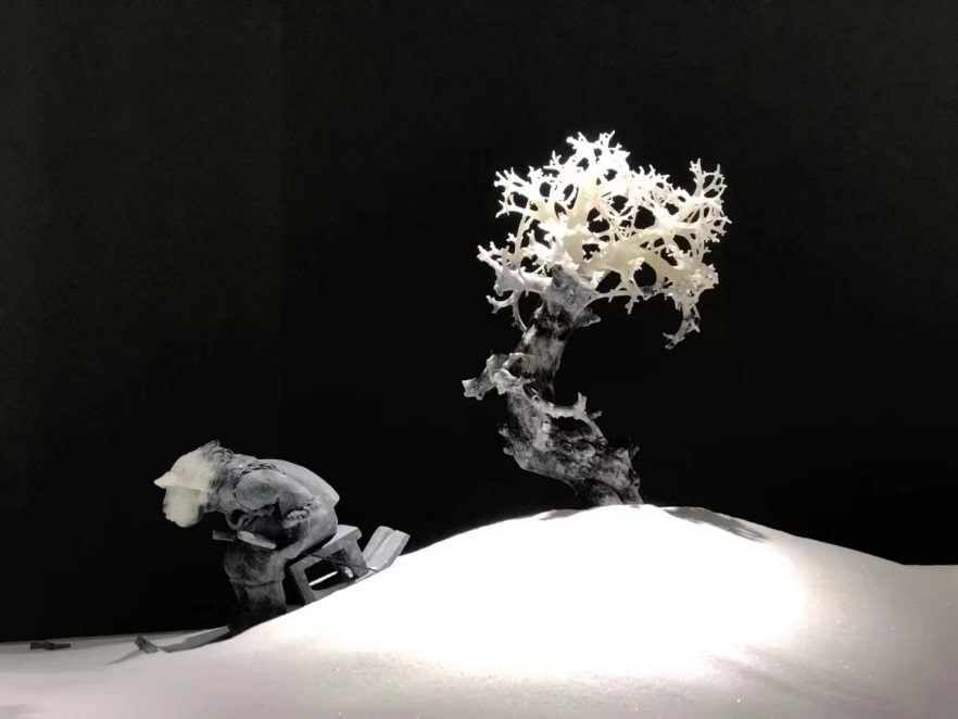 以雪乡为题材的玉雕。唐帅艺术馆供图